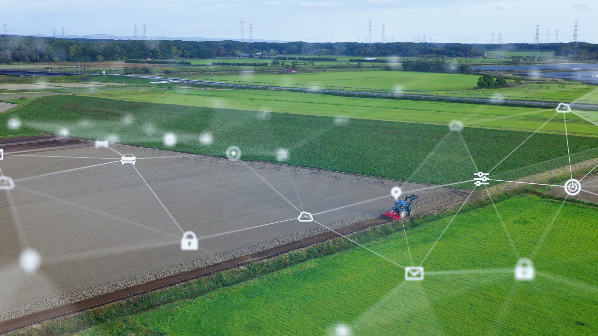 A farm superimposed with a graphic demonstrating remote sensing data acquisition and how it can be used for precision agriculture in future